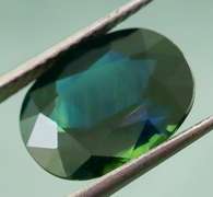 Heated only! 3.84ct midnight blue-green Sapphire