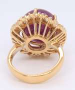 Opulent 14kt YG Cabochon Ruby with Wavy Baguette Halo Ring
