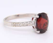 Dazzling White Gold Diamond and Oval Garnet Ring