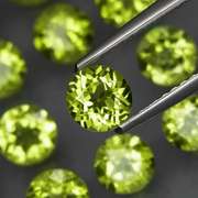 High grade 8.76ct untreated apple green Peridot set