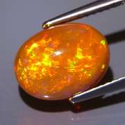 Exceptional 2.54ct full body flashing Semi Black Opal