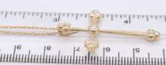 Attractive Yellow Gold Diamond Flared Edge Cross Pendant on Chain