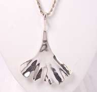Sterling Silver Tail Shaped Necklace.