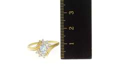 14K Yellow Gold Oval Blue Topaz Diamond Cluster Bypass Ring