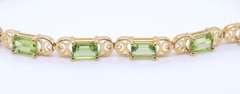 Gorgeous Yellow Gold Peridot Line Bracelet