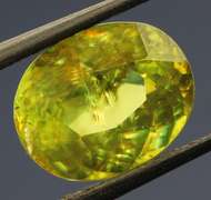 High fire 1.24ct rainbow flashing Sphene