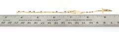 Fair14kt gold beaded bracelet with cross pendant