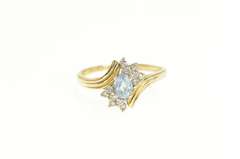 14K Yellow Gold Oval Blue Topaz Diamond Cluster Bypass Ring