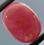 Shimmering 13.24ct top pinkish red Ruby cabochon