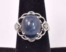 Sensational 11.11CTS Cabochon-Cut Star Sapphire & 0.08CTW Diamond Ring in Sterling Silver