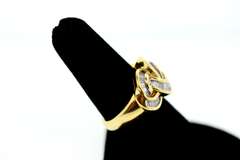 LADIES 18 KT YELLOW GOLD AND DIAMOND RING