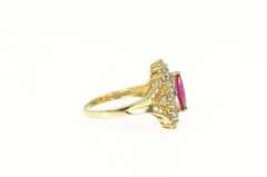 10K Yellow Gold Marquise Sim. Ruby Baguette Halo Statement Ring
