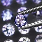 Glittering 5.11ct bright blue violet Tanzanite set