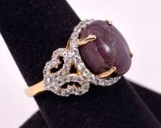 Sparkling 9.23CTS Cabochon-Cut Star Ruby and 1.07CTW White Sapphire Ring in Gold Plated Sterling Silver