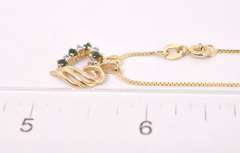 Elegant Emerald and Diamond Heart Pendant in 14K Yellow Gold