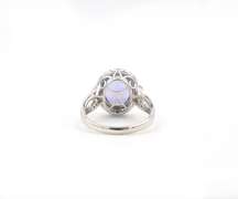 6.40ctw Tanzanite and Diamond Halo Ring