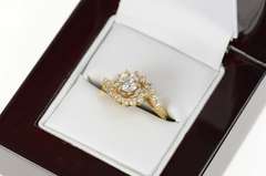 14K Yellow Gold 0.81 Ctw Diamond Swirl Halo Engagement Ring
