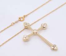 Attractive Yellow Gold Diamond Flared Edge Cross Pendant on Chain