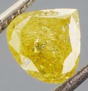 Rare .60ct pear cut canary yellow Diamond