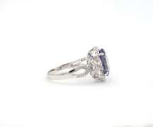 6.40ctw Tanzanite and Diamond Halo Ring