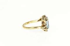 10K Yellow Gold Emerald Cut Blue Topaz Synthetic Ruby Bypass Ring