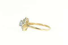 14K Yellow Gold Oval Blue Topaz Diamond Cluster Bypass Ring