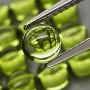 Pristine 10.69ct 16pc lime green Peridot set