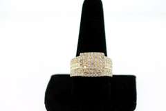 Regal 14k Yellow Gold Ring with Stepped Diamonds and Flanked by Baguette Diamonds
