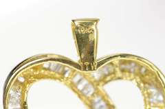 10K Yellow Gold 1.00 Ctw Baguette & Round Diamond Heart Pendant