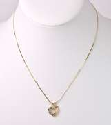 Elegant Emerald and Diamond Heart Pendant in 14K Yellow Gold