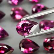 Ravishing 9.65ct violet pink Rhodolite Garnet set