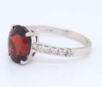 Dazzling White Gold Diamond and Oval Garnet Ring