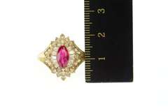 10K Yellow Gold Marquise Sim. Ruby Baguette Halo Statement Ring