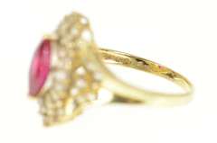 10K Yellow Gold Marquise Sim. Ruby Baguette Halo Statement Ring