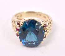 Luxurious London Blue Topaz and Ruby Ring in 14K Yellow Gold