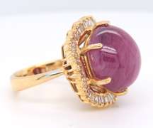 Opulent 14kt YG Cabochon Ruby with Wavy Baguette Halo Ring