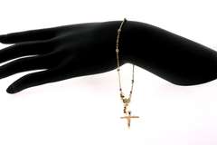 Fair14kt gold beaded bracelet with cross pendant