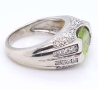 Charming White Gold oval Peridot and Diamond Ring