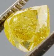 Rare .60ct pear cut canary yellow Diamond