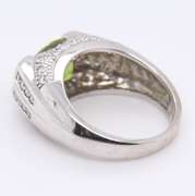 Charming White Gold oval Peridot and Diamond Ring