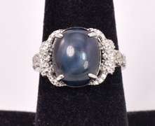 Stunning 8.83CTS Star Sapphire and 0.40CTW Diamond Sterling Silver Ring