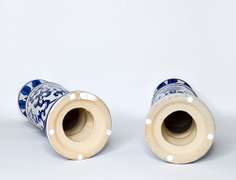 Two Large Cobalt Blue and White Chinoiserie Ceramic Candle Holders With Floral Design