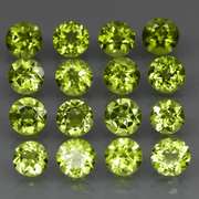 High grade 8.76ct untreated apple green Peridot set