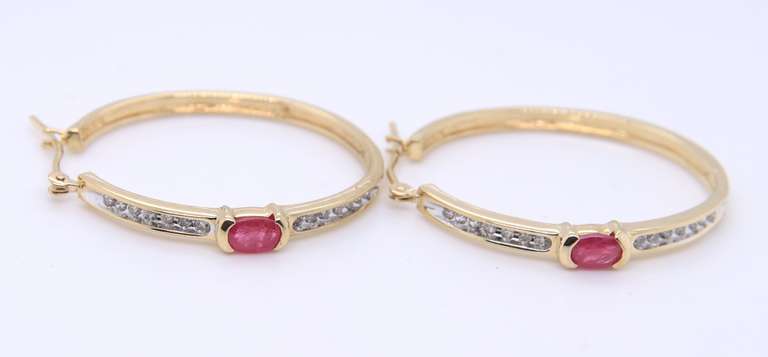 Charming Yellow Gold oval Ruby & Diamond Hoop Earrings