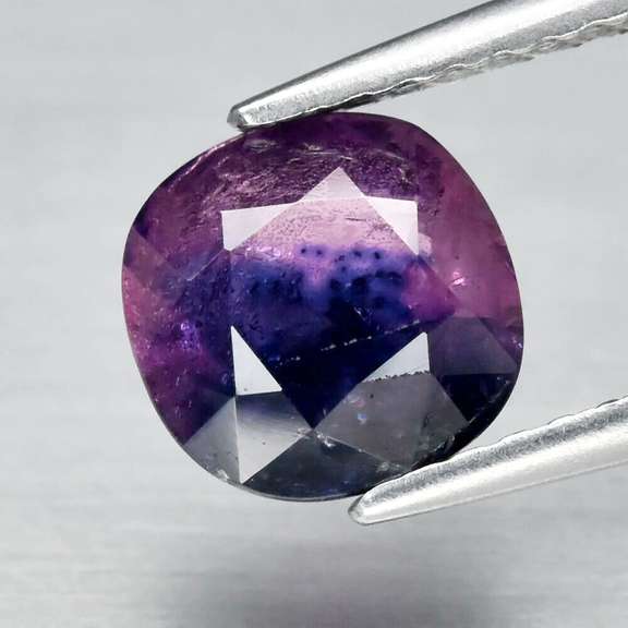 Swirling multi-color 1.58ct cushion cut Sapphire