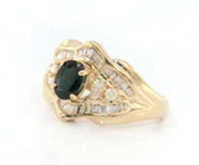 Handsome Yellow Gold oval Sapphire and Baguette Diamond Ring
