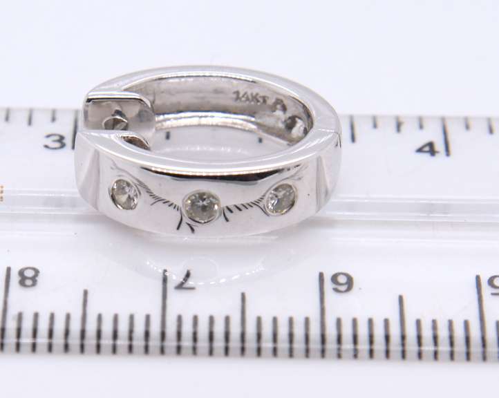 Attractive White Gold 3 Stone Diamond oval Huggies