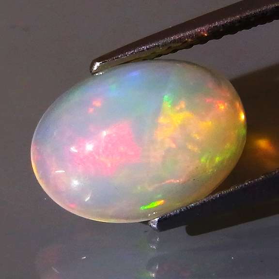 Glowing! 2.45ct full cover multi-pattern Jelly Opal