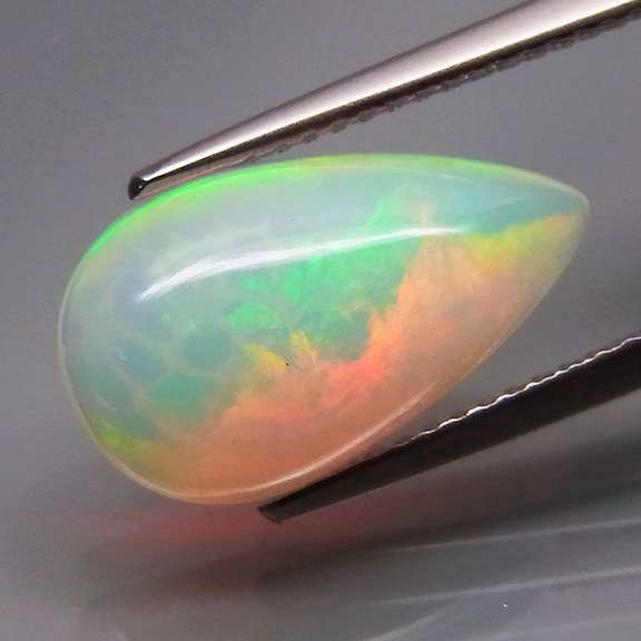 Captivating 2.95ct rainbow honeycomb flashing Opal