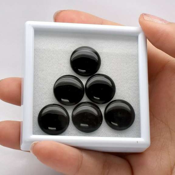 Substantial 39.30 carats of untreated silky black Onyx